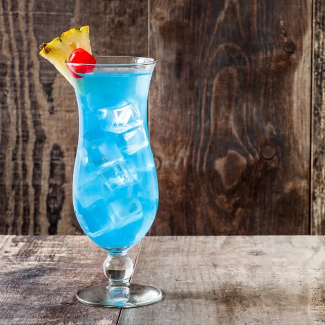 Tropical Paradise in a Glass: Blue Hawaii Cocktail Delight