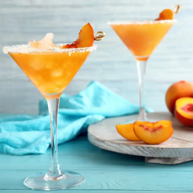 Sweet Peach Bliss: Indulge in Our Margarita Creation