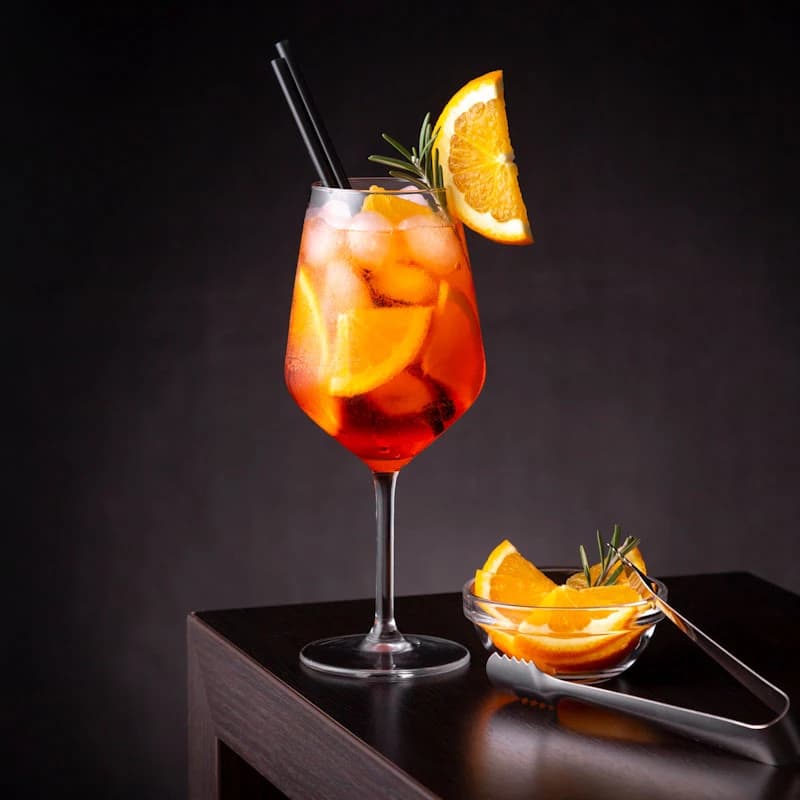 Aperol Spritz Cocktail in a wine glass with orange slice garnish